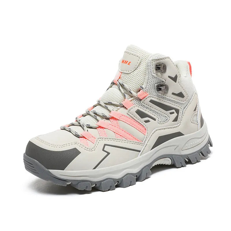 Gray and pink hiking shoes offering all-terrain comfort and grip, ideal for outdoor adventures and long-distance trekking.